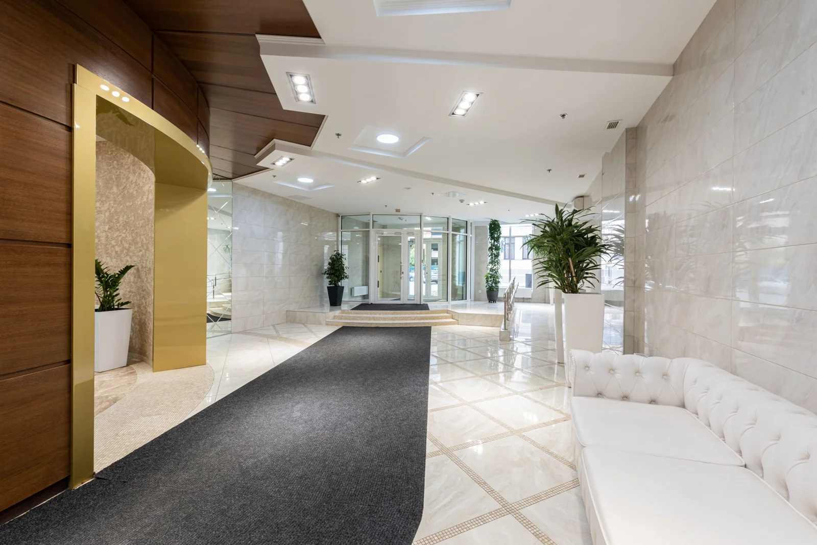 A spacious lobby with seating and common access areas